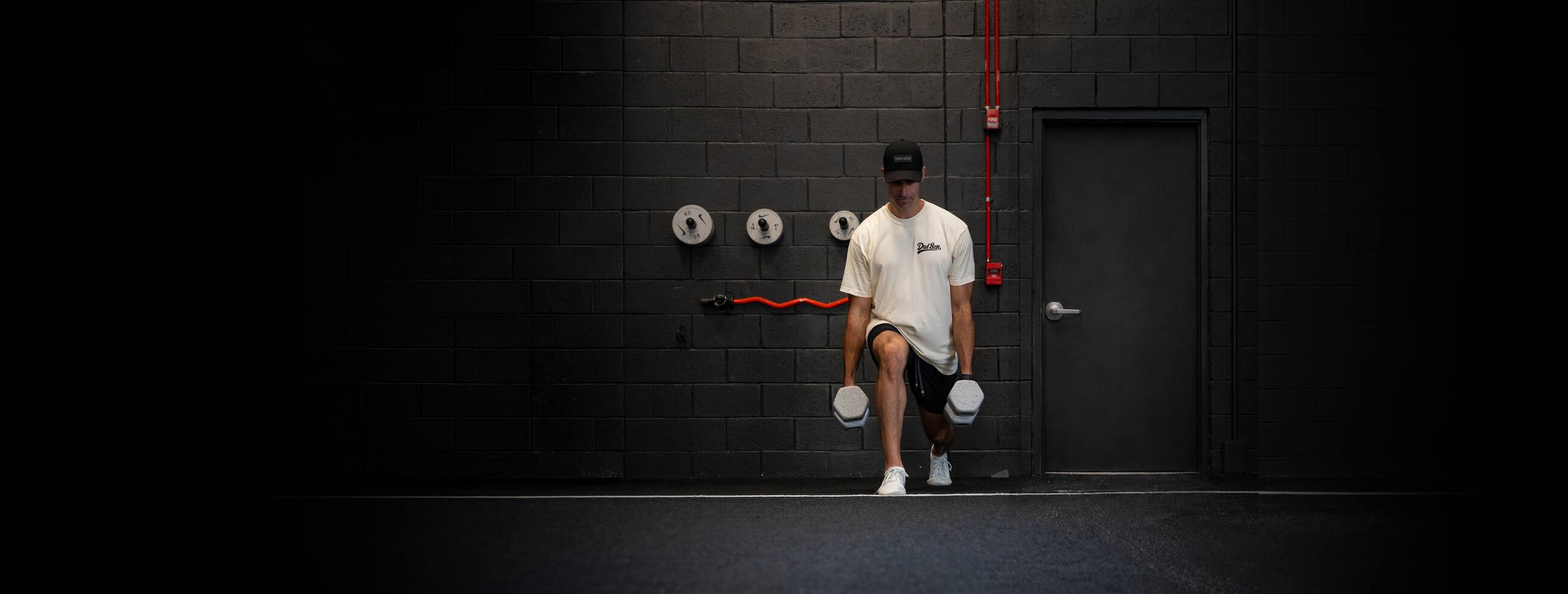 Pat O'Donnell training with dumbbells at the Sixteen Elite gym in Jupiter, FL